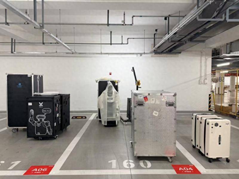 備齊倉儲、修理、充電功能，上千臺機器人入駐“運動員村”